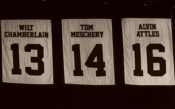 Meschery's number hangs from the rafters among lofty company at Oracle Arena.